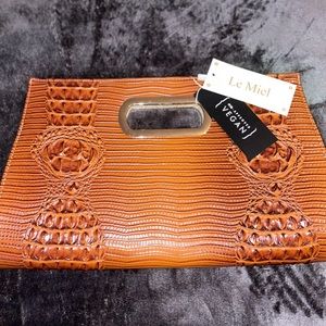 ❌SOLD❌ Crocodile print cut out handle, large clutch satchel.
